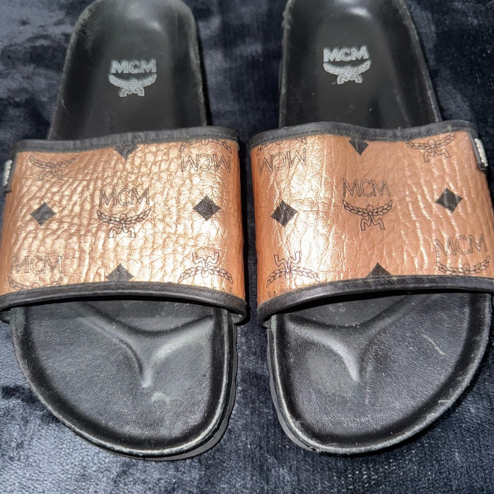 MCM Tan and Black Logo Slides